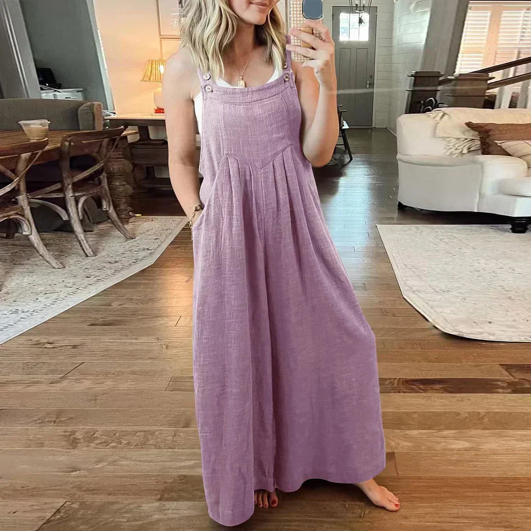 đ Ărmlös jumpsuit med vida ben och fickor för damer