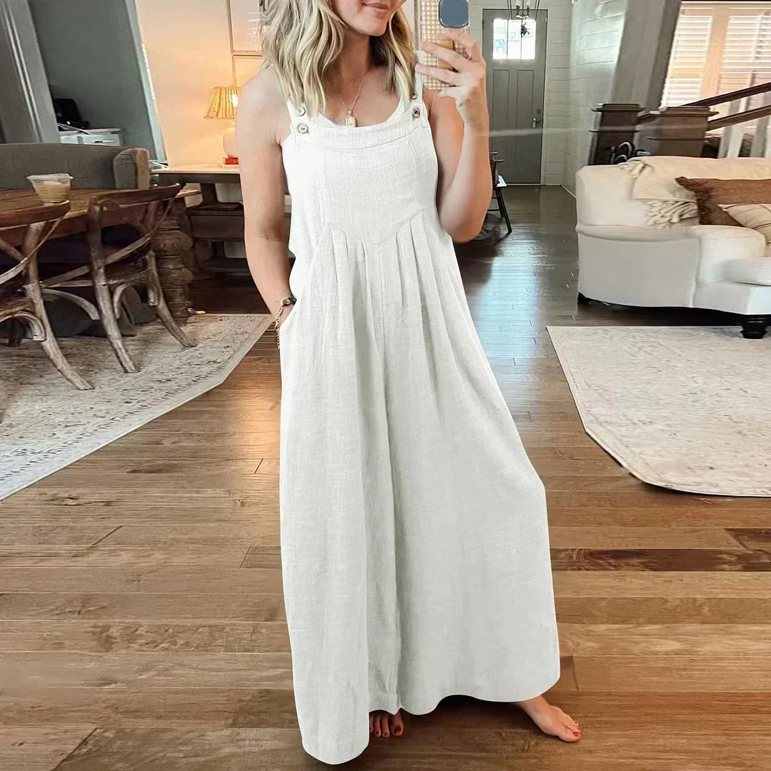 đ Ărmlös jumpsuit med vida ben och fickor för damer