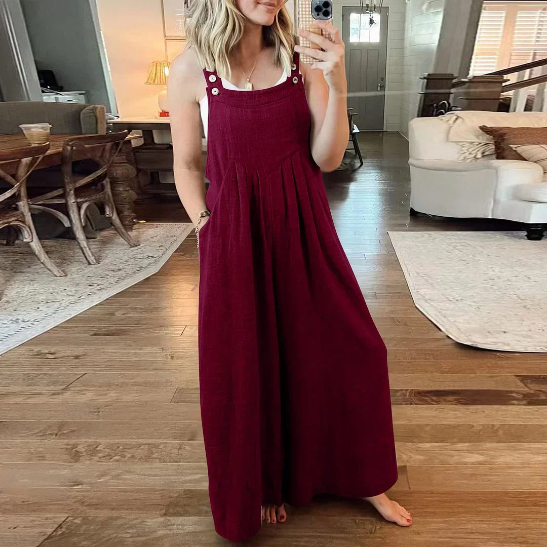 đ Ărmlös jumpsuit med vida ben och fickor för damer
