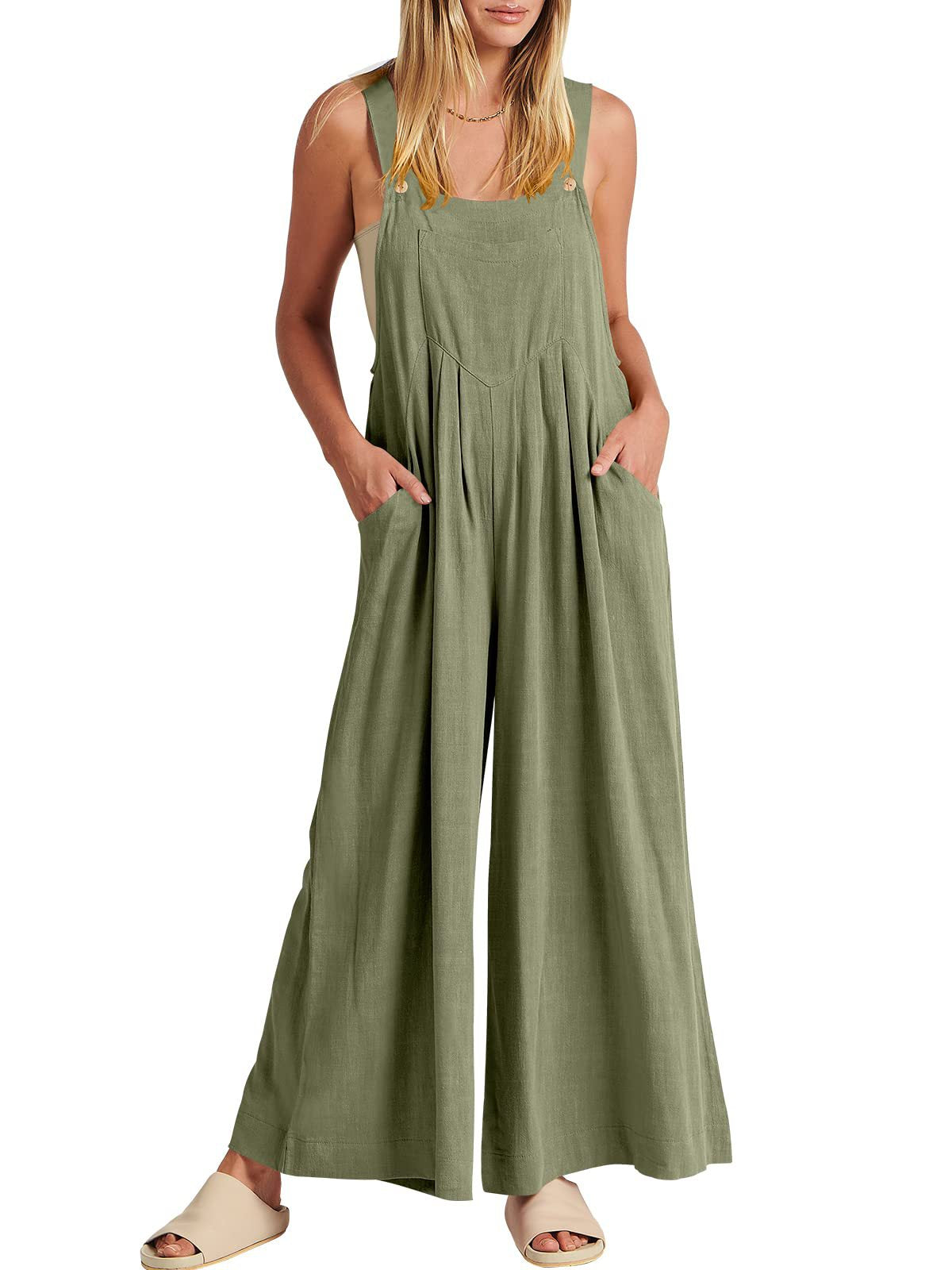 đ Ărmlös jumpsuit med vida ben och fickor för damer