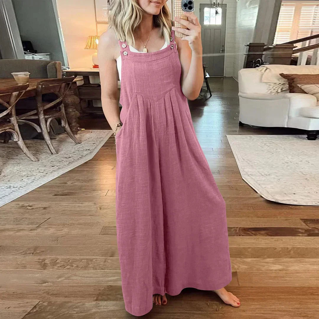 đ Ărmlös jumpsuit med vida ben och fickor för damer