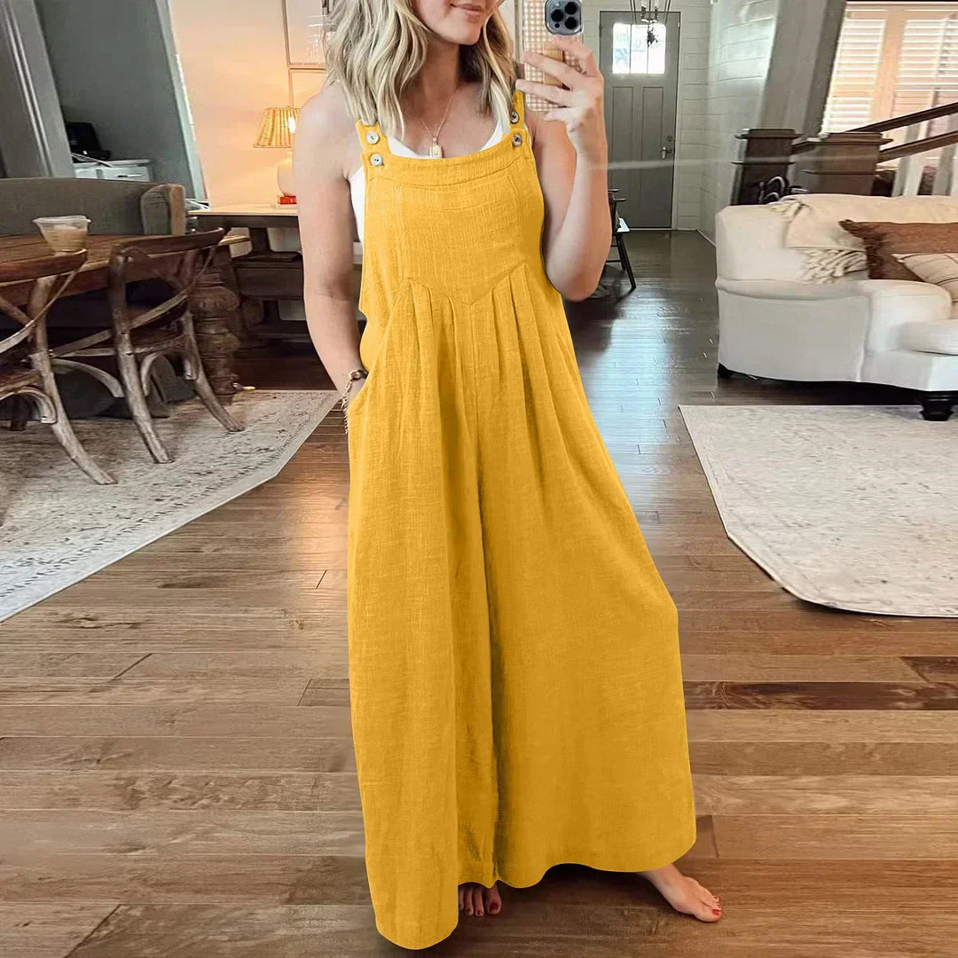 đ Ărmlös jumpsuit med vida ben och fickor för damer