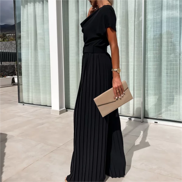 Enfärgad jumpsuit med hög midja och veckade ben