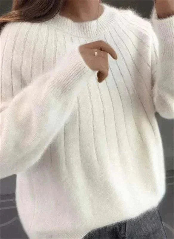 đ„Cashmere, fluffig tröja i enfĂ€rgad modell