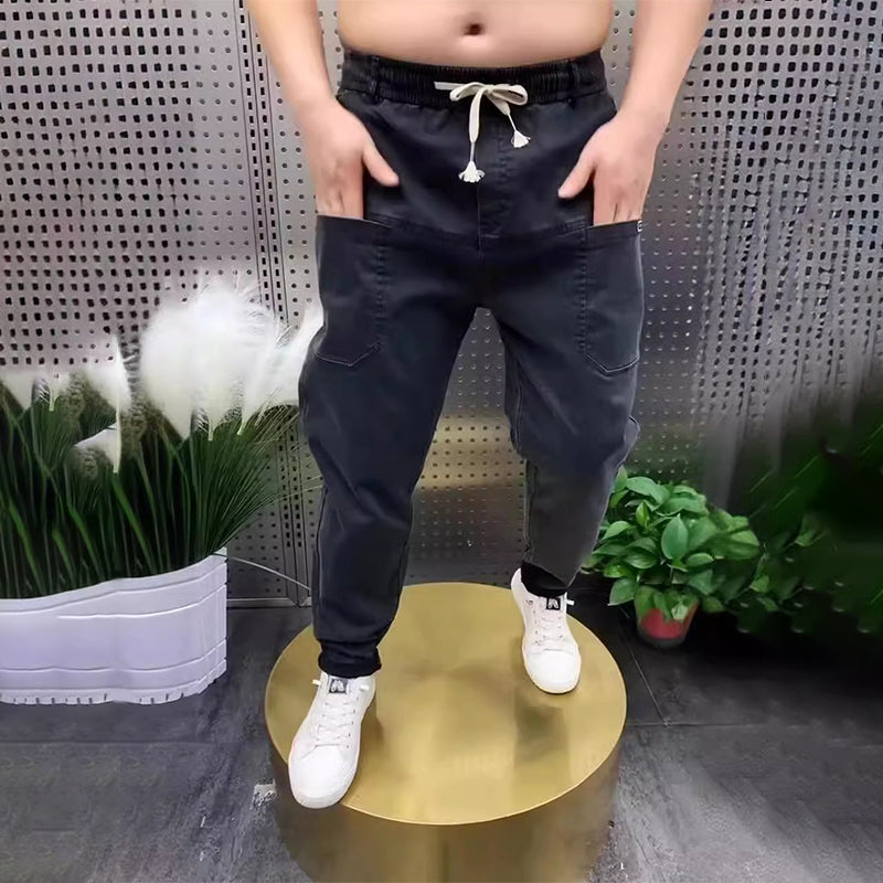 Herrjeans med elastisk dragsko och sex fickor