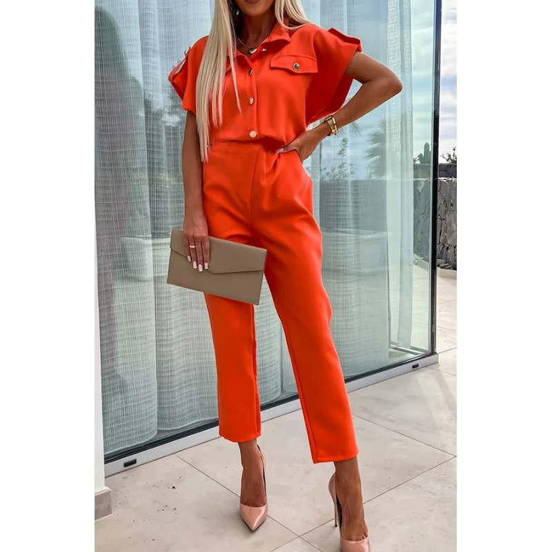 Trendig enfärgad jumpsuit med fickor