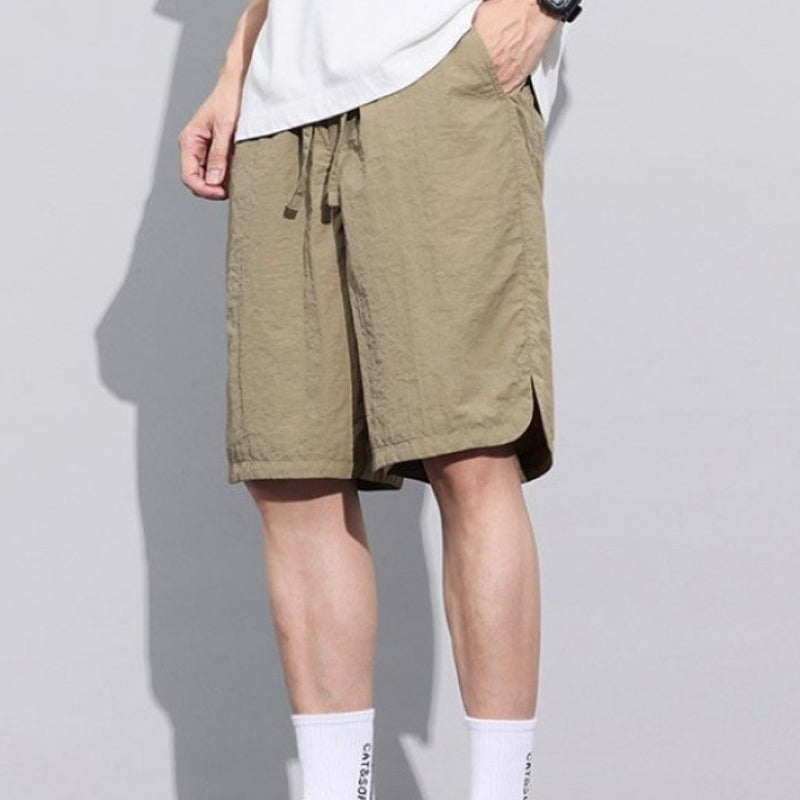 Sommarshorts för män med fickor och löst sittande passform