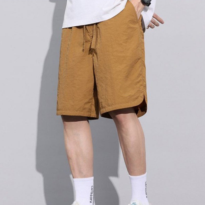 Sommarshorts för män med fickor och löst sittande passform