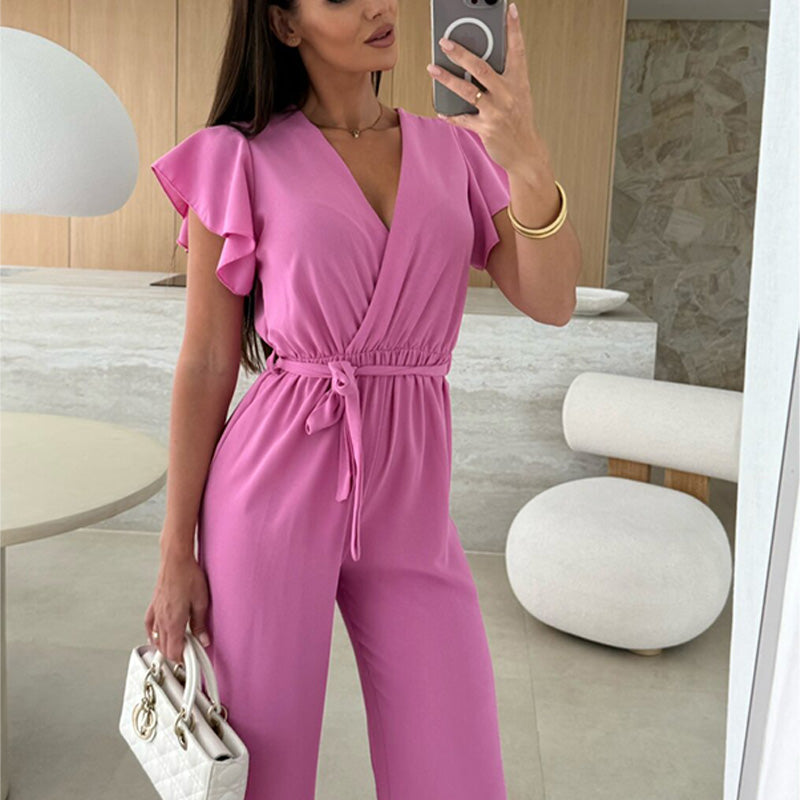Enfärgad jumpsuit för kvinnor med V-ringning, volangärmar och vida ben