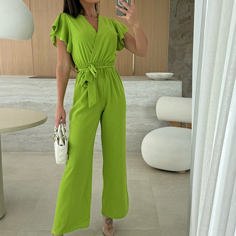 Enfärgad jumpsuit för kvinnor med V-ringning, volangärmar och vida ben