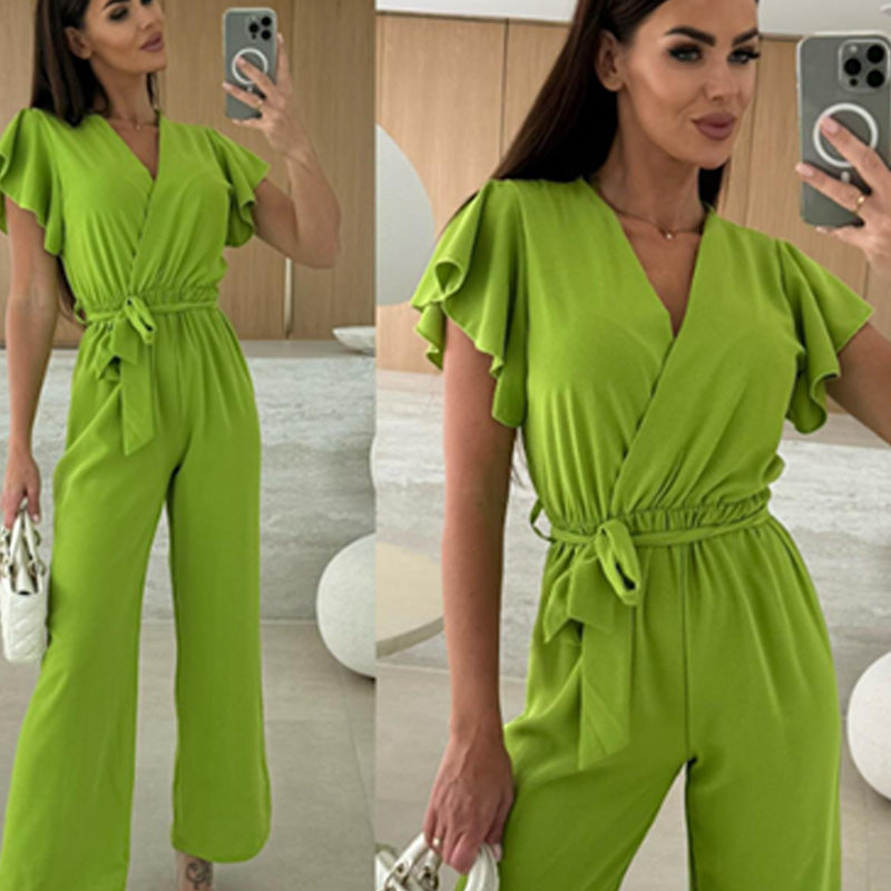 Enfärgad jumpsuit för kvinnor med V-ringning, volangärmar och vida ben