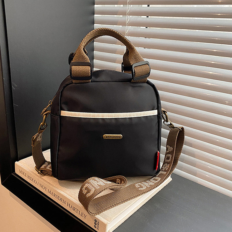 Mångsidig crossbody-väska med stor kapacitet