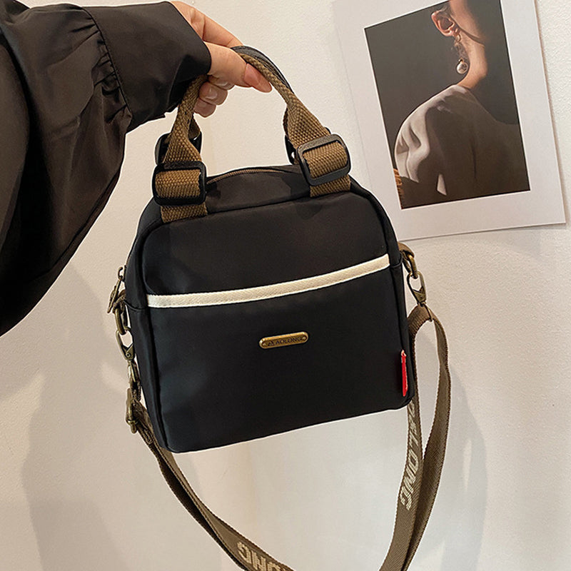 Mångsidig crossbody-väska med stor kapacitet
