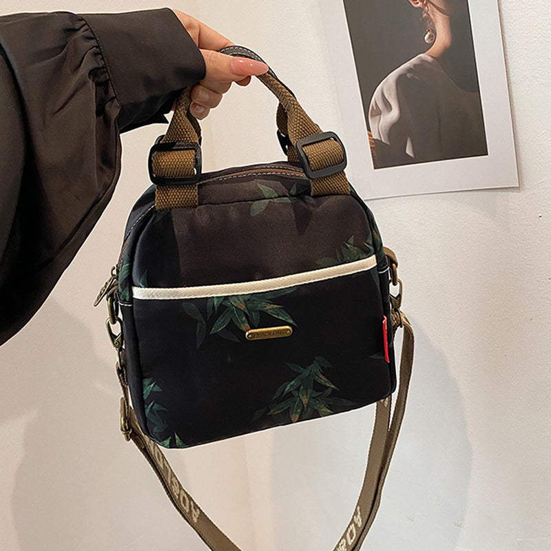 Mångsidig crossbody-väska med stor kapacitet