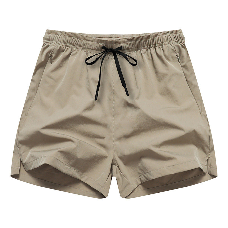 Snabbtorkande sportshorts för män med fickor