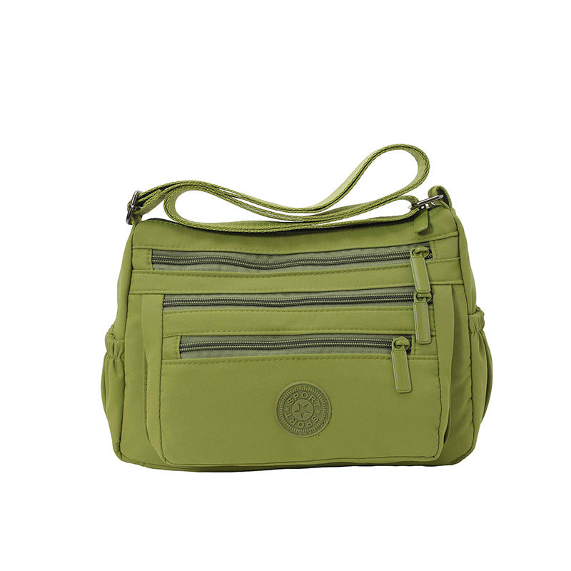 Lätt crossbody-väska i nylon med flera fickor