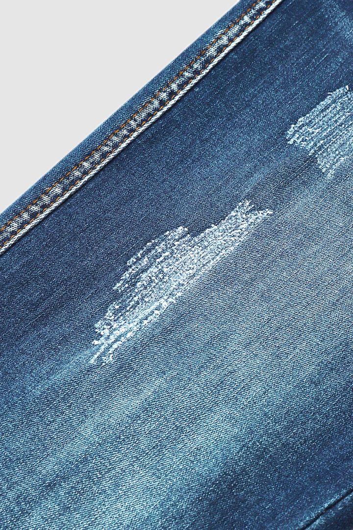 Slitna capris-jeans med upprullad fåll