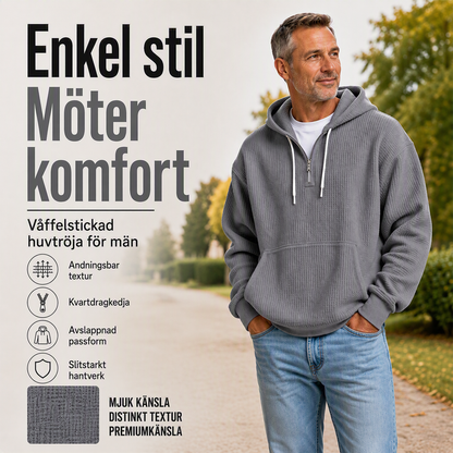 Huvtröja i stickat material med kort dragkedja för män