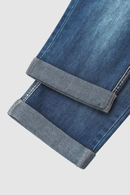 Slitna capris-jeans med upprullad fåll