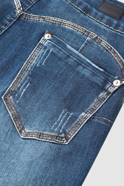 Slitna capris-jeans med upprullad fåll