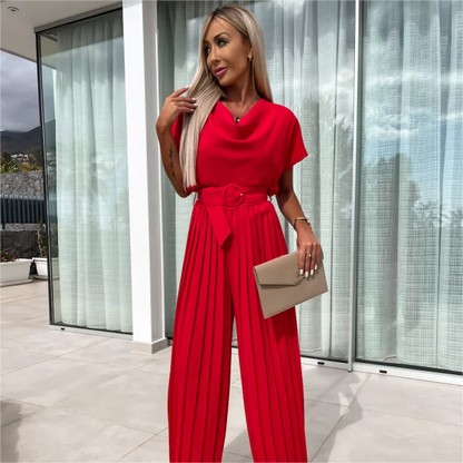 Enfärgad jumpsuit med hög midja och veckade ben