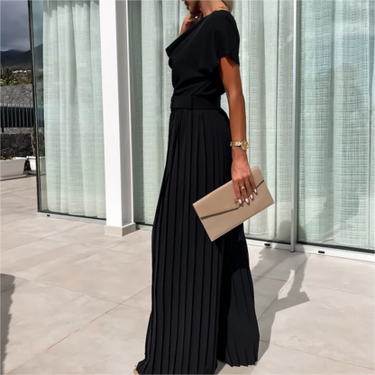 Enfärgad jumpsuit med hög midja och veckade ben