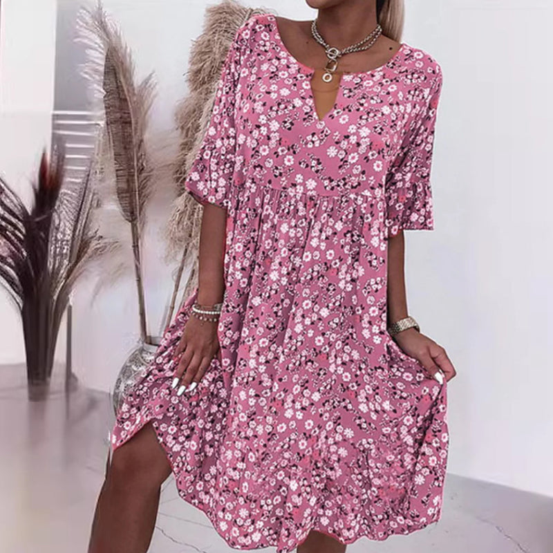 🌸49% rabatt👗- Kvinnors trendiga V-ringade halvärmsblommiga klänning
