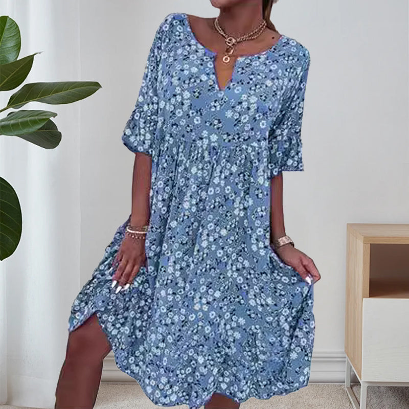 🌸49% rabatt👗- Kvinnors trendiga V-ringade halvärmsblommiga klänning