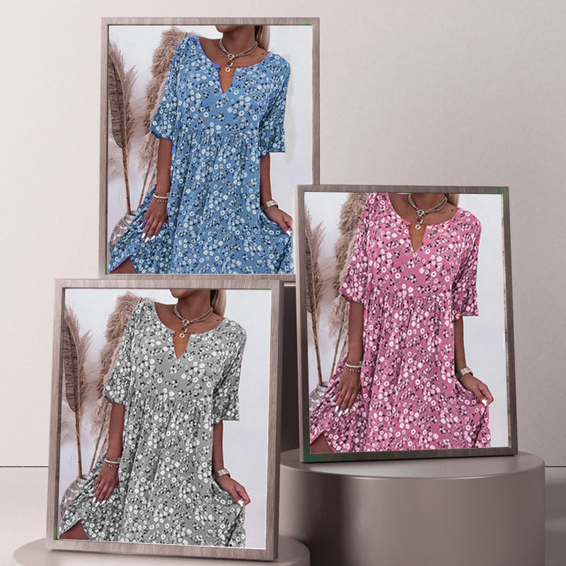 🌸49% rabatt👗- Kvinnors trendiga V-ringade halvärmsblommiga klänning