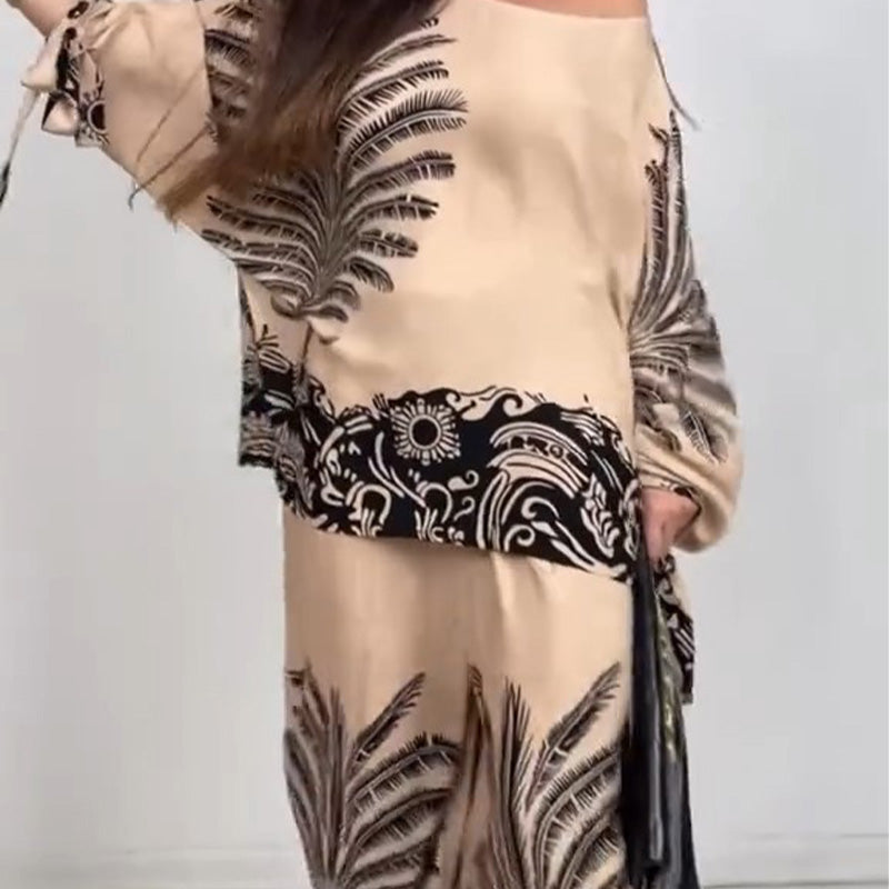 Elegant set med byxor med vida ben och topp i etnisk stil för kvinnor