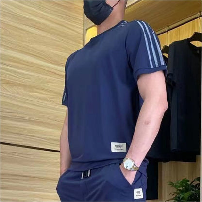 2-delat set med kortärmad topp och joggingbyxor med hög stretch för män