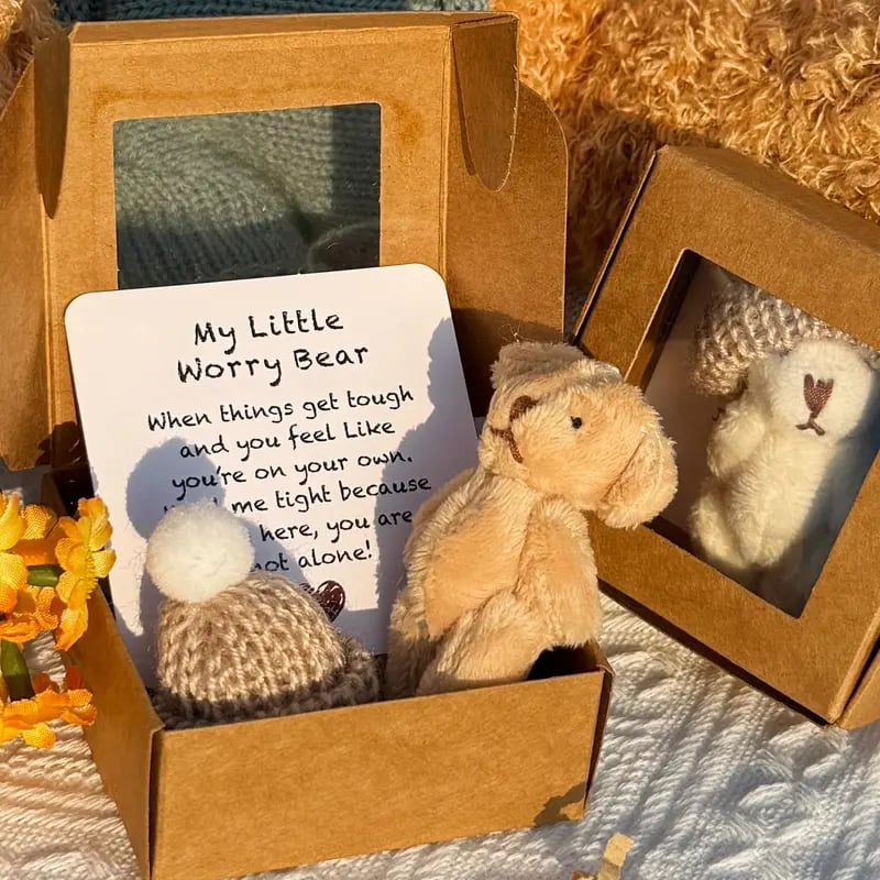 Mini plyschnalle i låda