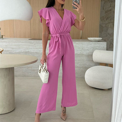 Enfärgad jumpsuit för kvinnor med V-ringning, volangärmar och vida ben