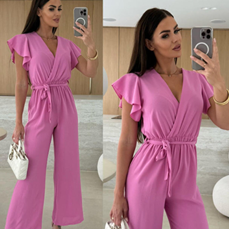 Enfärgad jumpsuit för kvinnor med V-ringning, volangärmar och vida ben