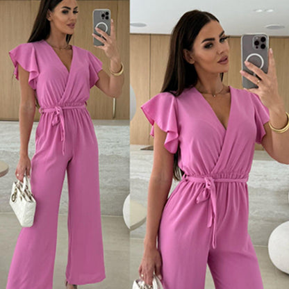 Enfärgad jumpsuit för kvinnor med V-ringning, volangärmar och vida ben