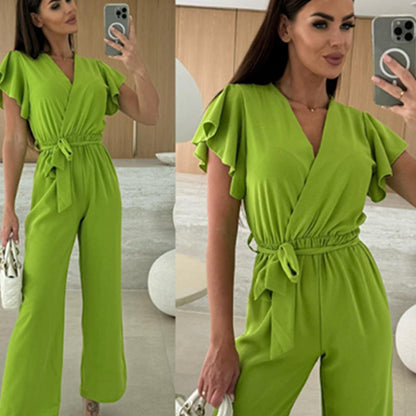 Enfärgad jumpsuit för kvinnor med V-ringning, volangärmar och vida ben