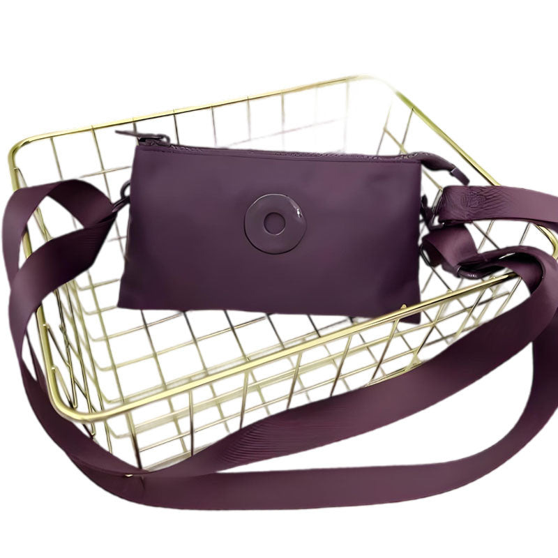 Modig zip-crossbody-väska