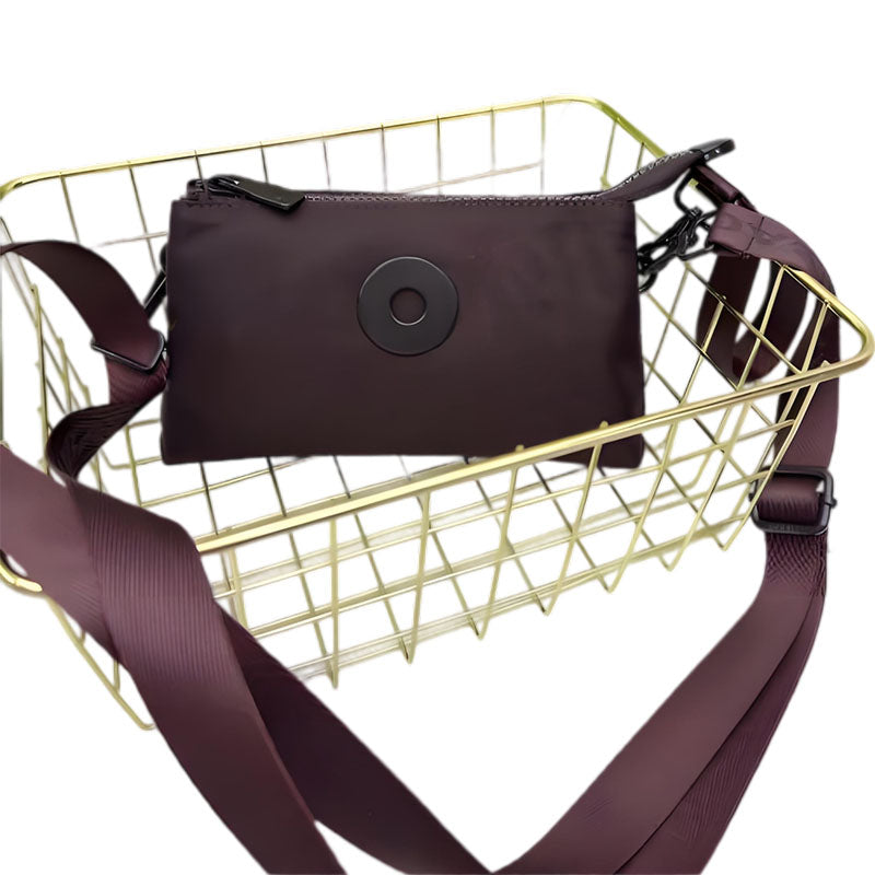 Modig zip-crossbody-väska
