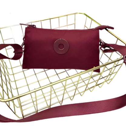 Modig zip-crossbody-väska