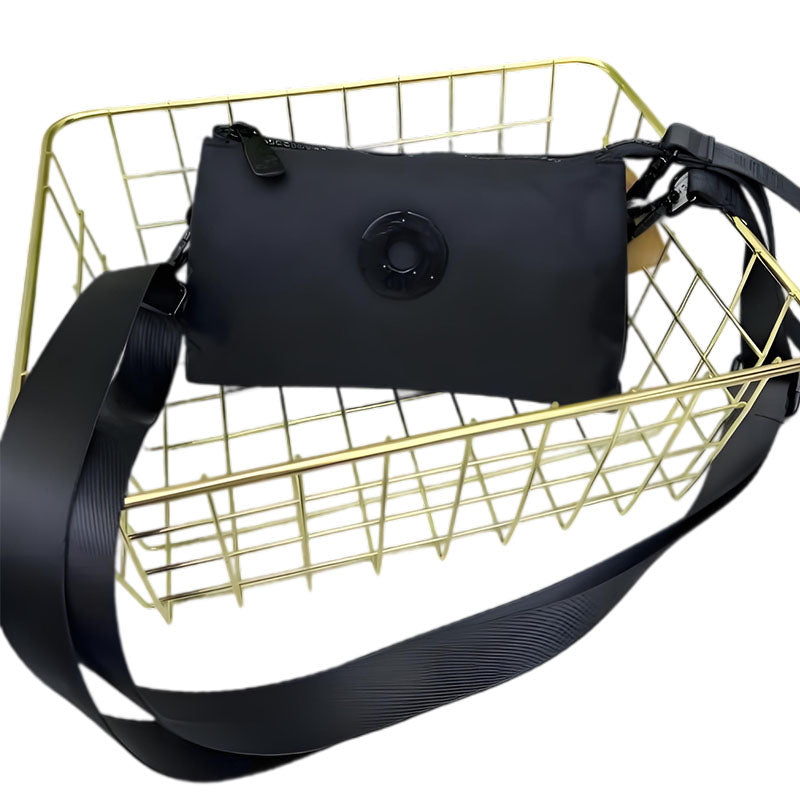 Modig zip-crossbody-väska