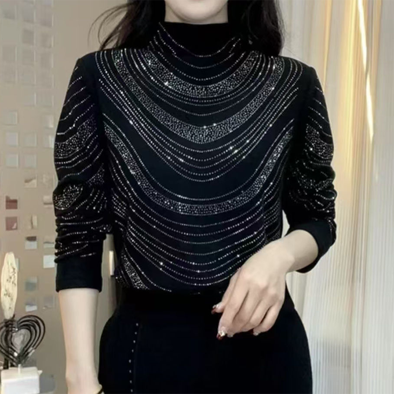 Elegant långärmad damtröja med paljetter
