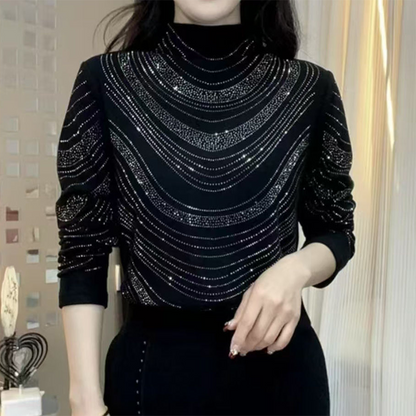 Elegant långärmad damtröja med paljetter