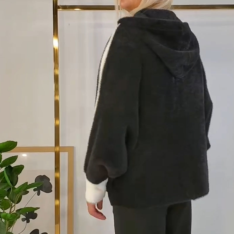 Mjuk och varm jacka med huva och randiga detaljer för damer