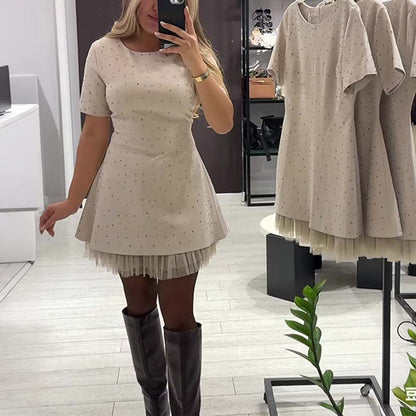 Kvinnors glittrande miniklänning med spetsar och korta ärmar | Elegant och glittrande