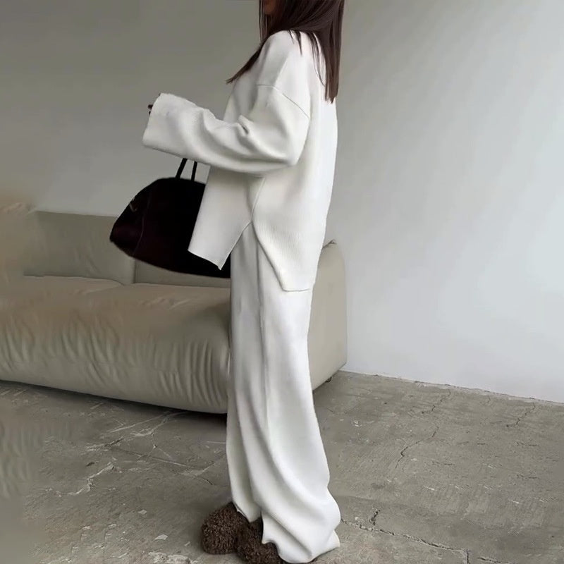 2-delat set med damtröja och byxor med vida ben