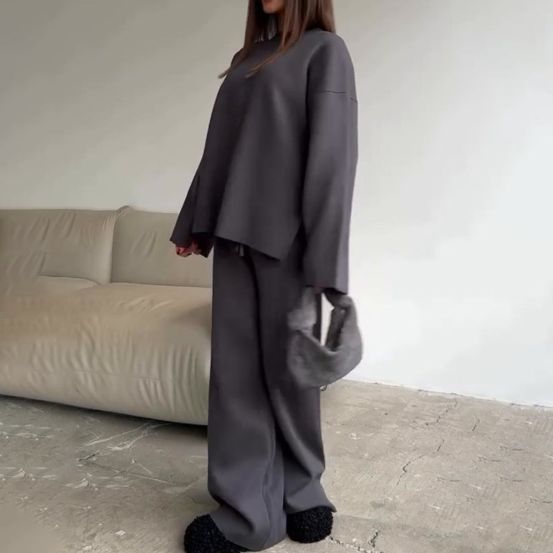 2-delat set med damtröja och byxor med vida ben