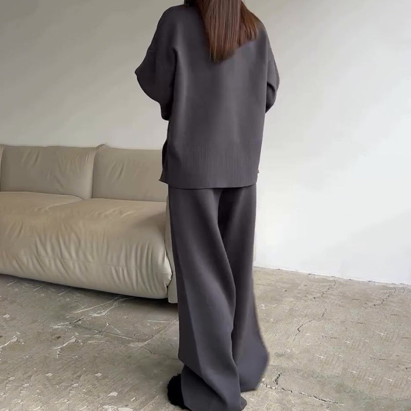 2-delat set med damtröja och byxor med vida ben