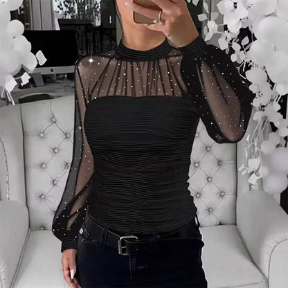 Top i transparent mesh med imiterade pärlor och lanternärmar