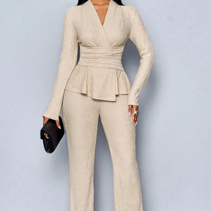 2-delat set med peplum-top och byxor för kvinnor