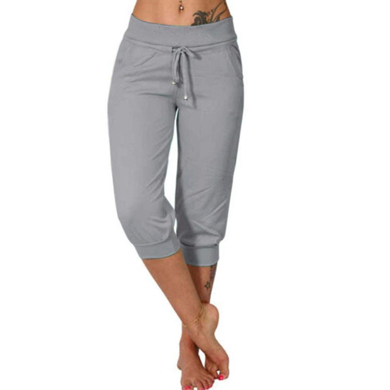 Joggingbyxor med hög midja och smal passform, dragsko och fickor